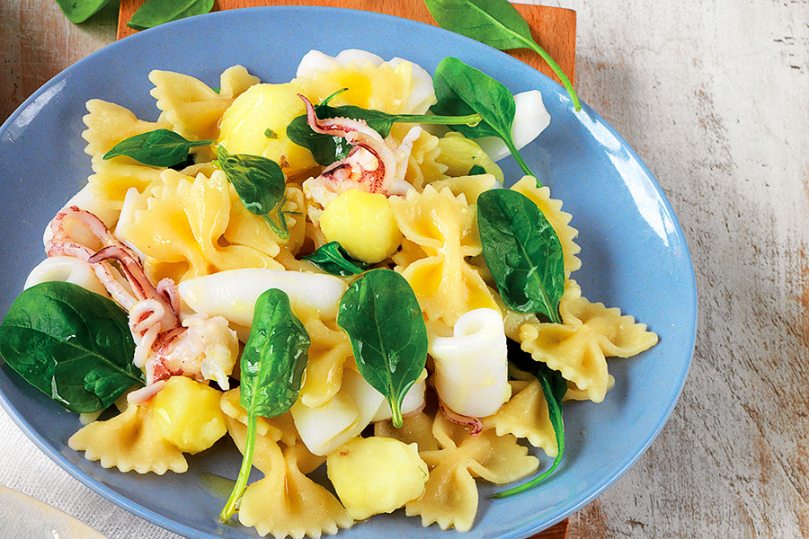 Farfalle with squid and fresh spinach