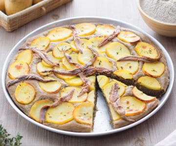 Burnt wheat focaccia with potatoes and anchovies
