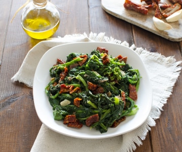 Turnip greens with dried tomatoes and anchovies
