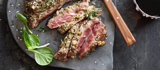 Baked steak with shallots, ginger and sesame