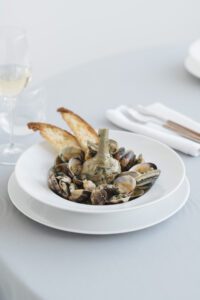 Clam stew with Roman-style artichokes