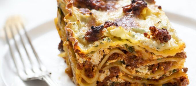 Curly lasagna with three meats sauce and cream cheese
