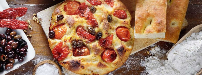 Focaccia from Bari with cherry tomatoes and olives, Mediterranean authenticity and Apulian tradition in a single bite