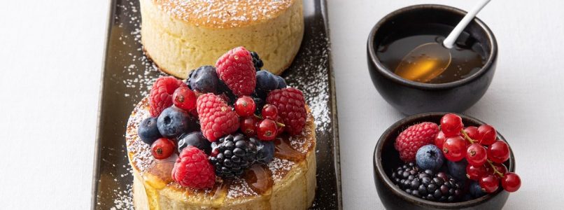 Japanese pancakes in a pan with berries