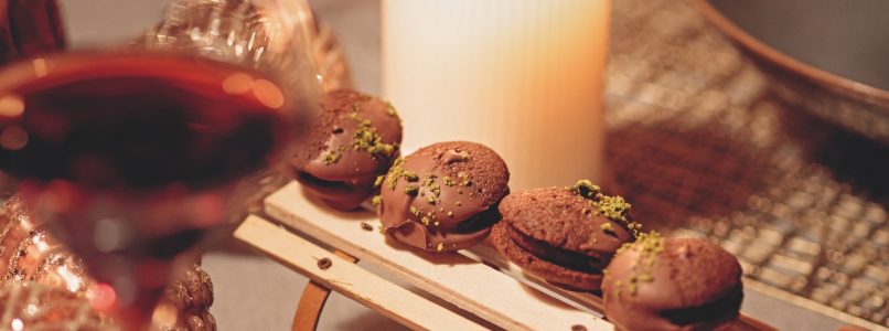 Neros recipe, cocoa biscuits with dark chocolate ganache and pistachios