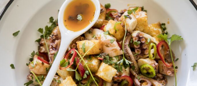 Octopus salad and crispy croutons