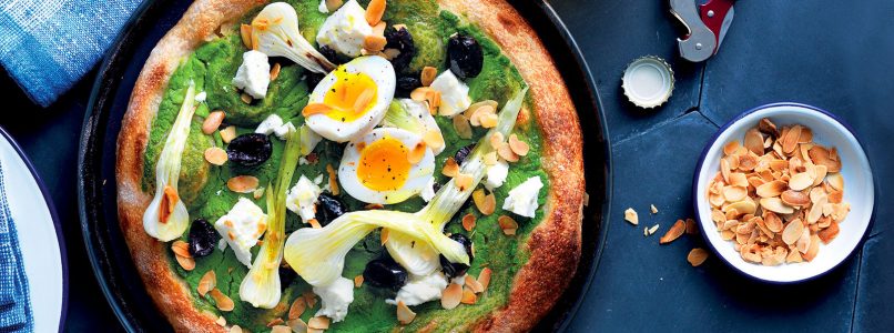 Pizza recipe with pea cream, spring onion, feta cheese and hard boiled egg