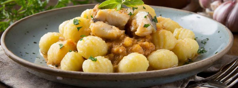 Potato gnocchi with fish and legume ragù