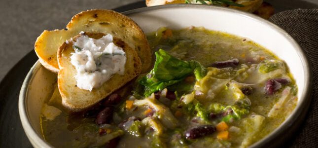 Red bean and escarole soup with aromatic pesto