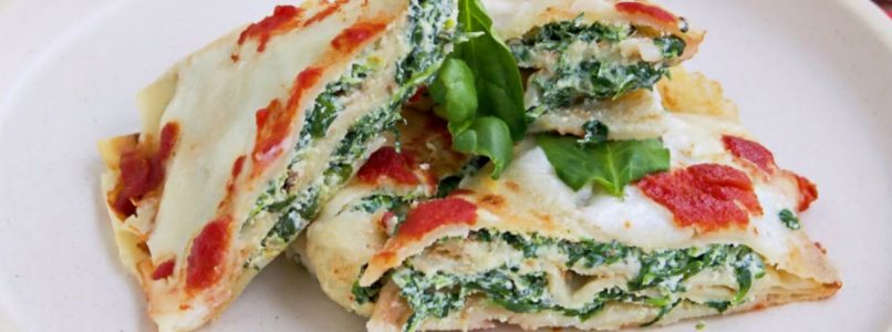 Ricotta and spinach crepes with tomato sauce