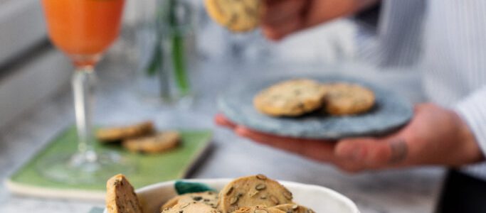 Savory biscuits with pepper, lemon and pumpkin seeds