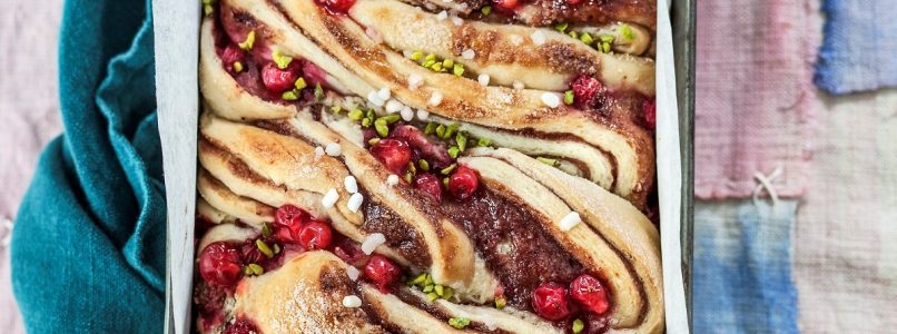 Sweet red currant braid with chopped pistachios