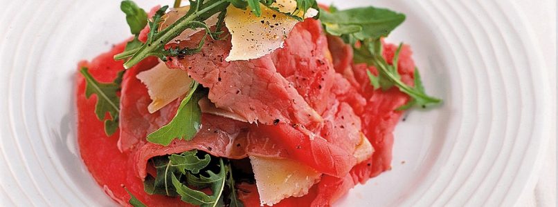 Veal carpaccio with rocket and parmesan